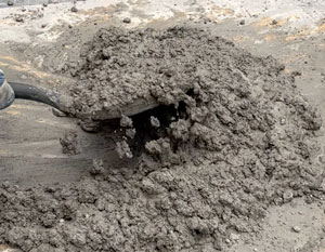 Proceso de revoltura para hacer la mezcla de concreto Proceso de revoltura para hacer la mezcla de concreto